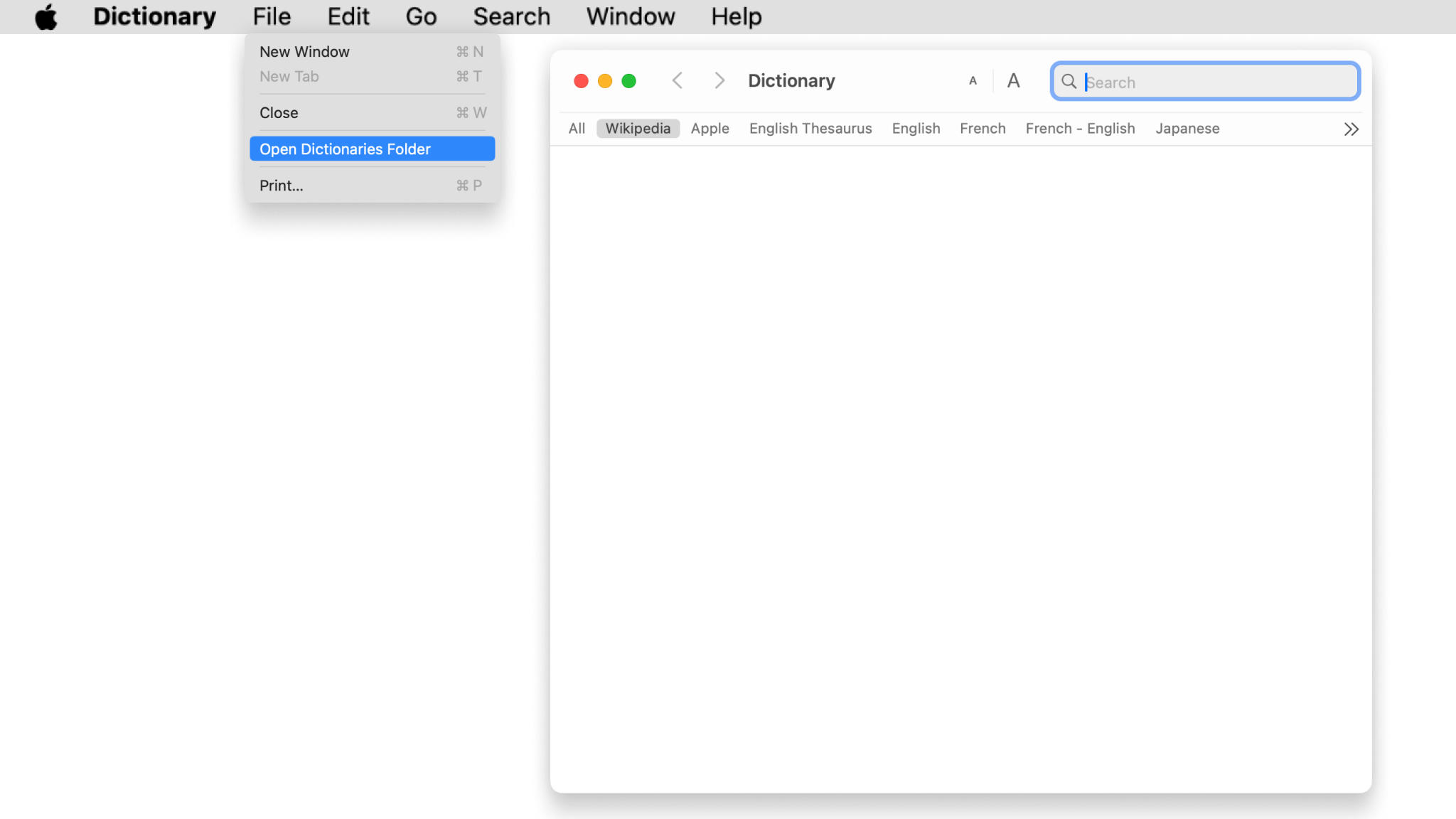 A screenshot of the Mac Dictionary app showing the Files menu, with the option to open the dictionaries folder.